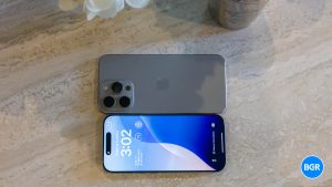 iOS 26 iPhone 16 Pro Max on a table.